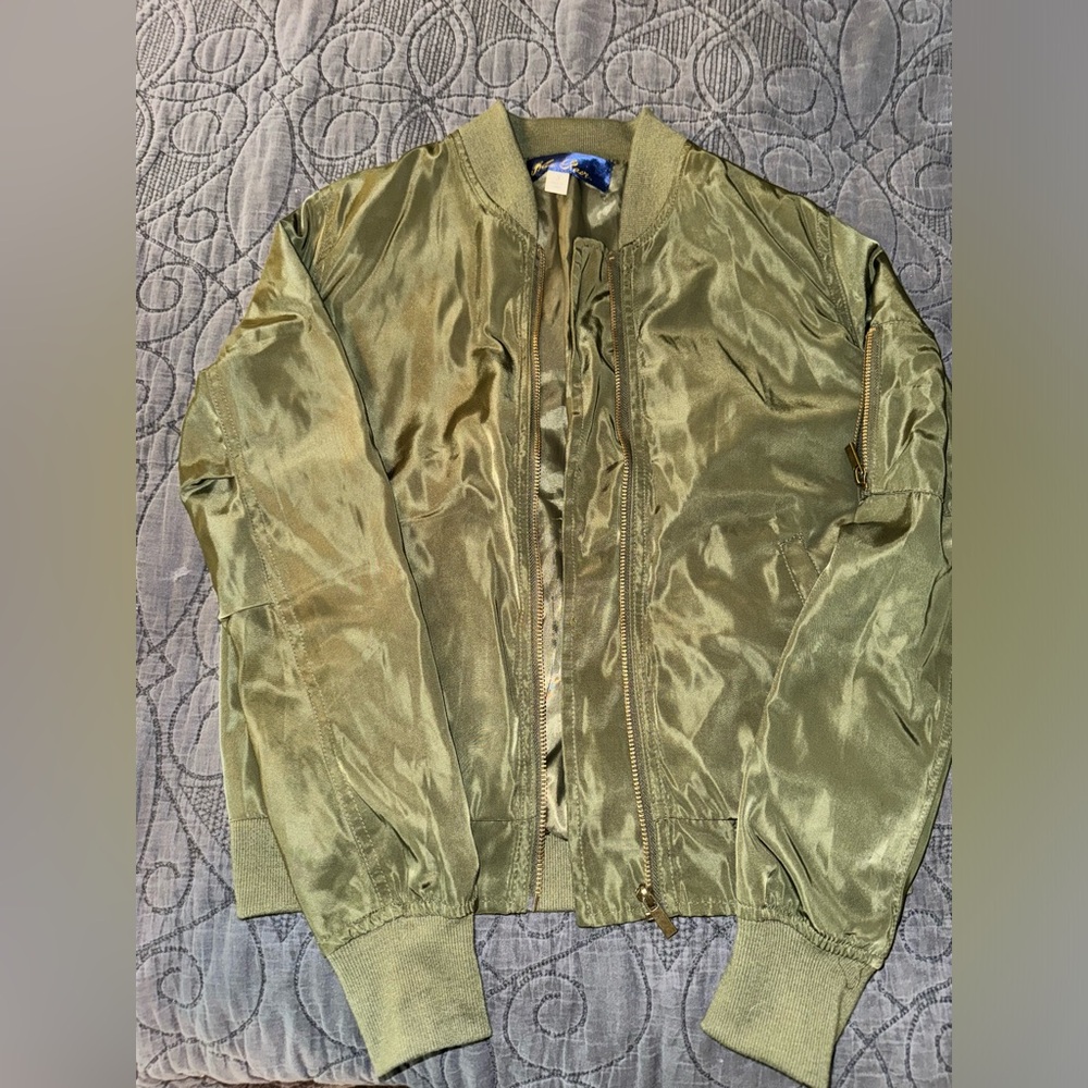 blue rain green bomber jacket